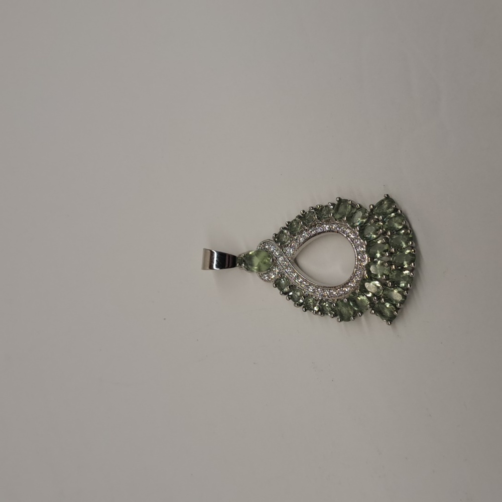 Silver pendant with beautiful green stones and cz